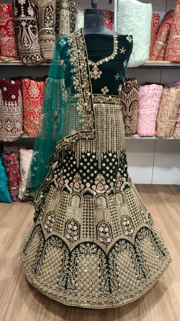 Tanot Creation Emerald Green Velvet Lehenga | Golden & Pink Handwork